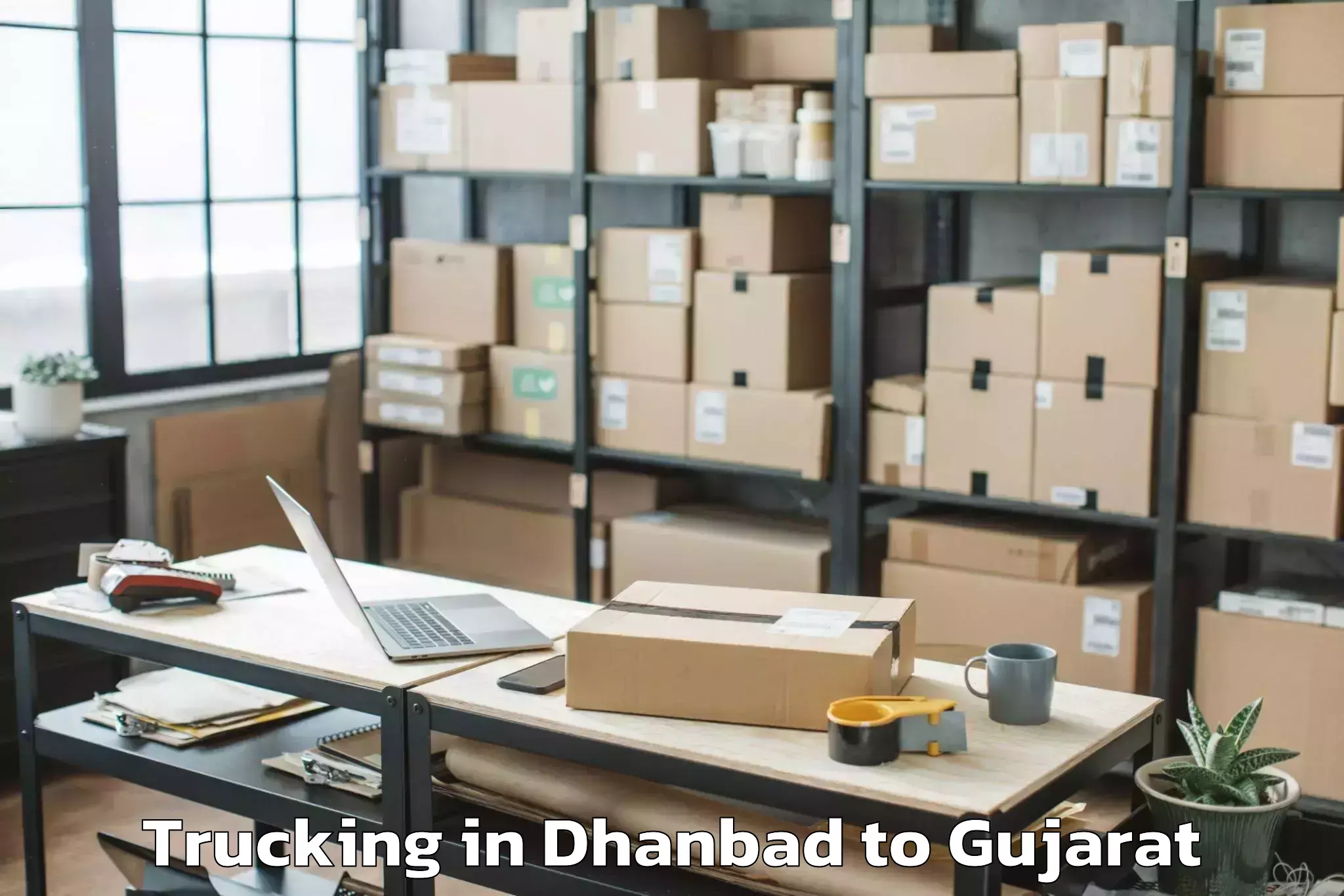 Easy Dhanbad to Vav Trucking Booking